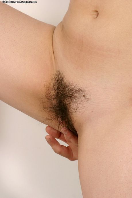 Japanese babe with tiny titties strips and shows her pussy up close