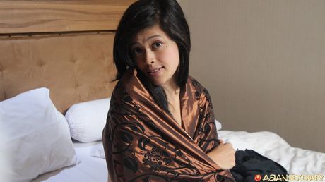 Asian teen Jita strips off her lingerie and shows her hairy cunt