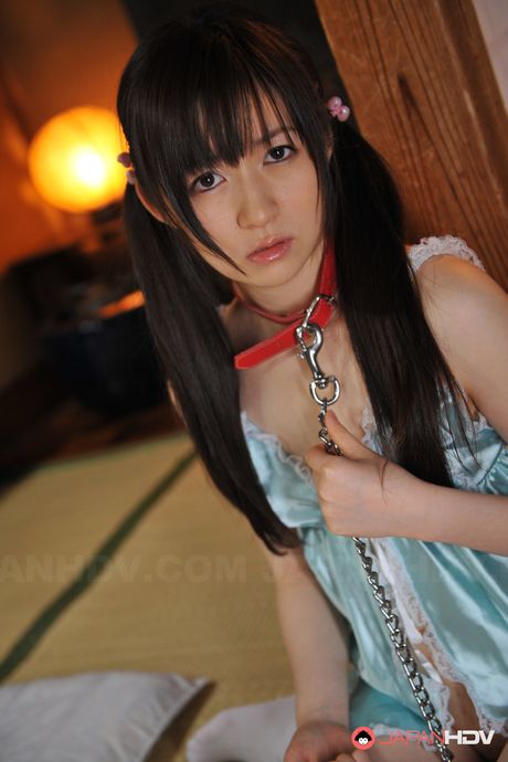 Beautiful homeless Japanese lady Ai Uehara posing with a sexy leash