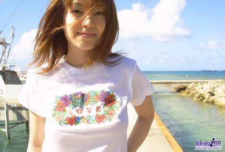 Naughty slut Nana smiles as she shows off her groomed hairy pussy and tight ass