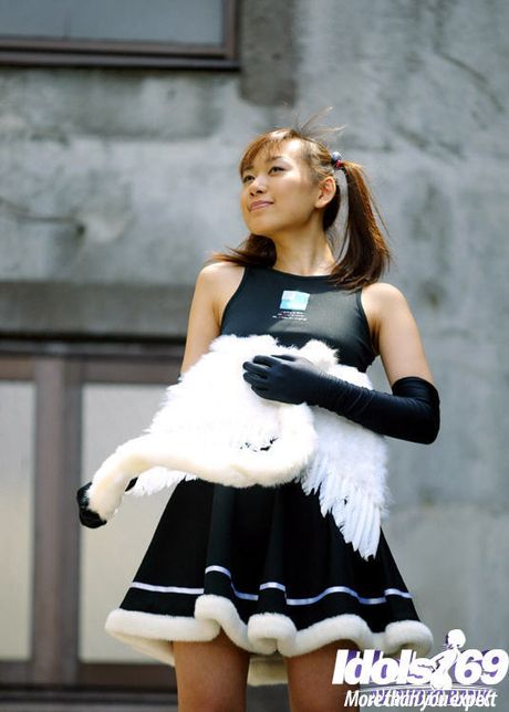 Svelte japanese teen Akane bares small tits and hairy beaver